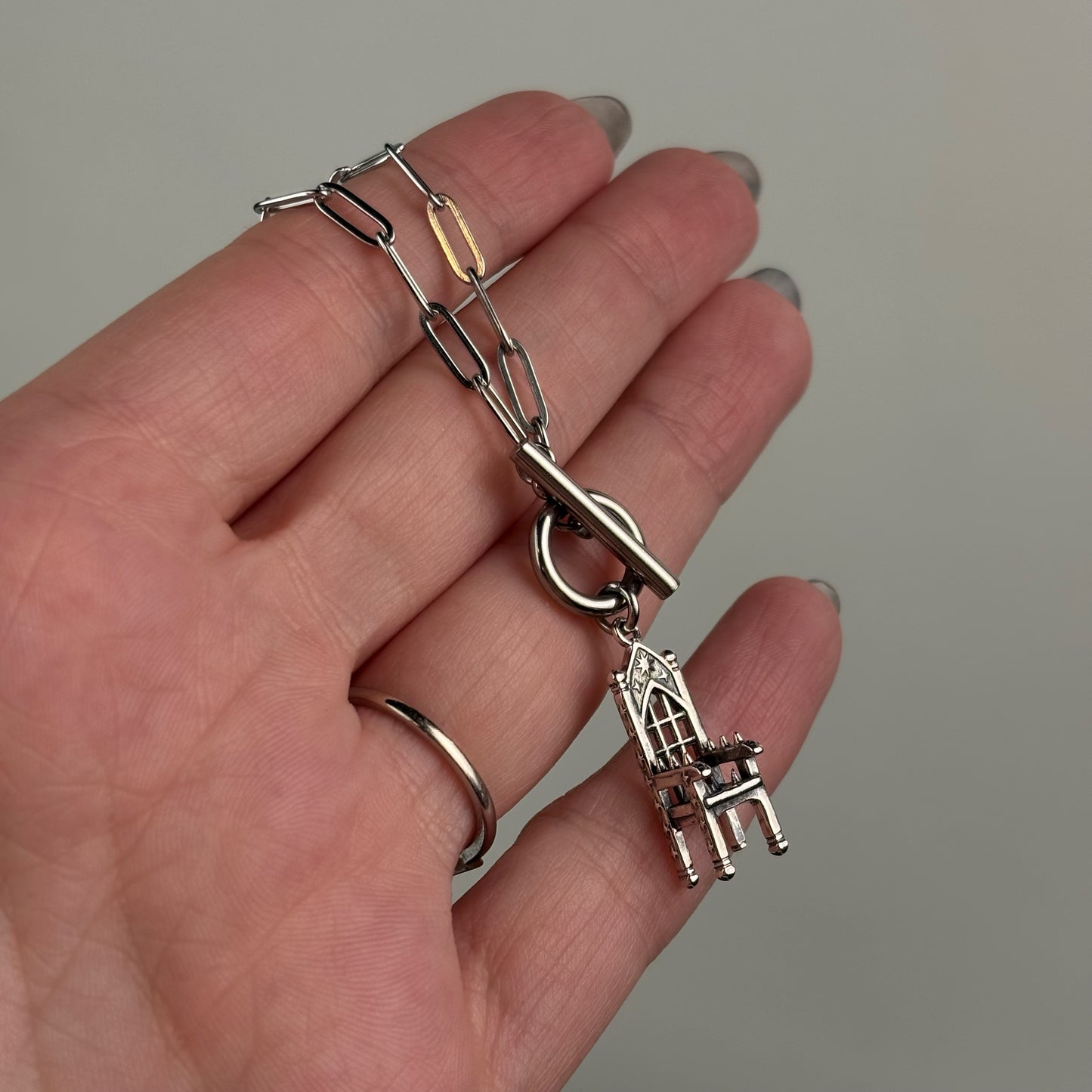 Oopsie Torture Chair Necklace