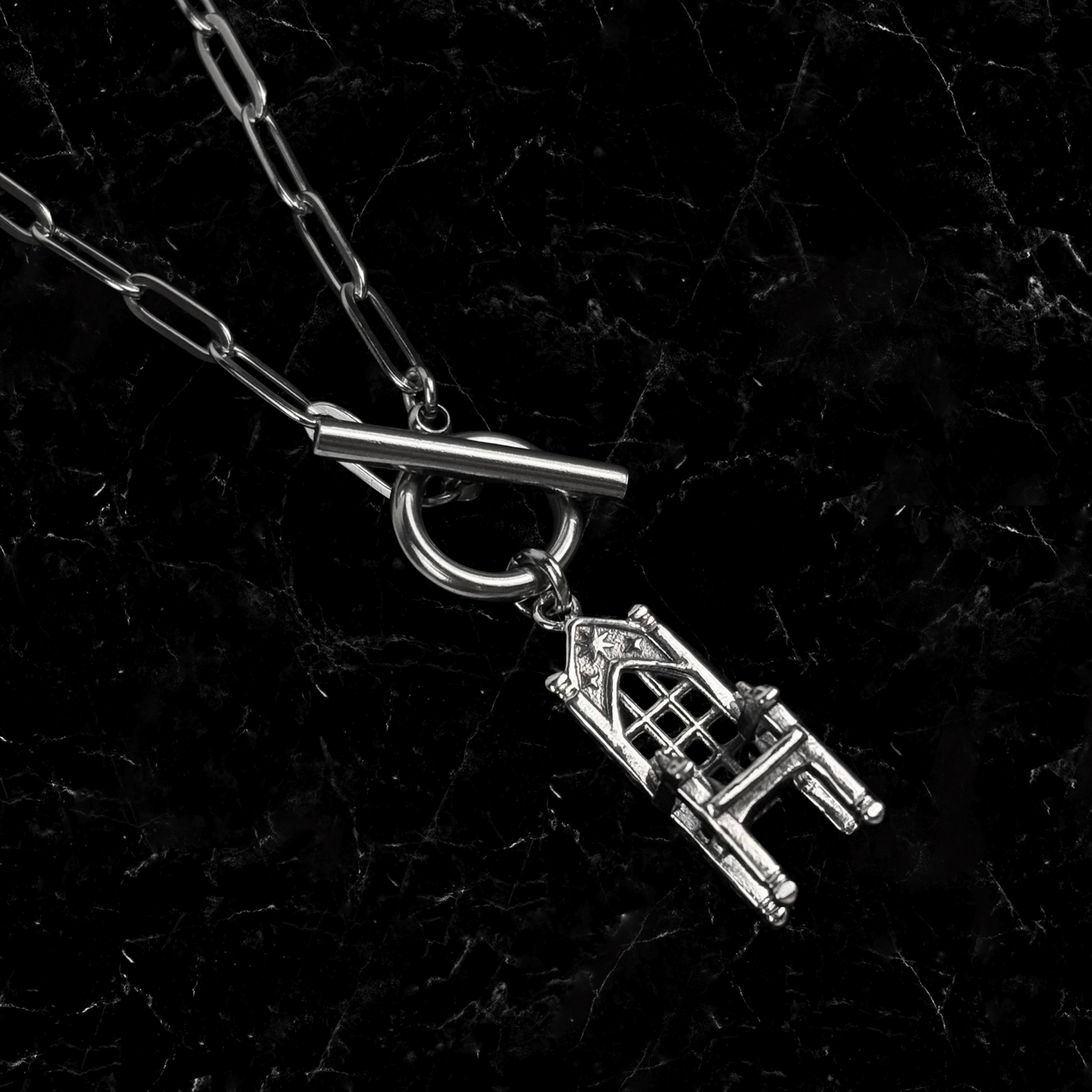 Oopsie Torture Chair Necklace